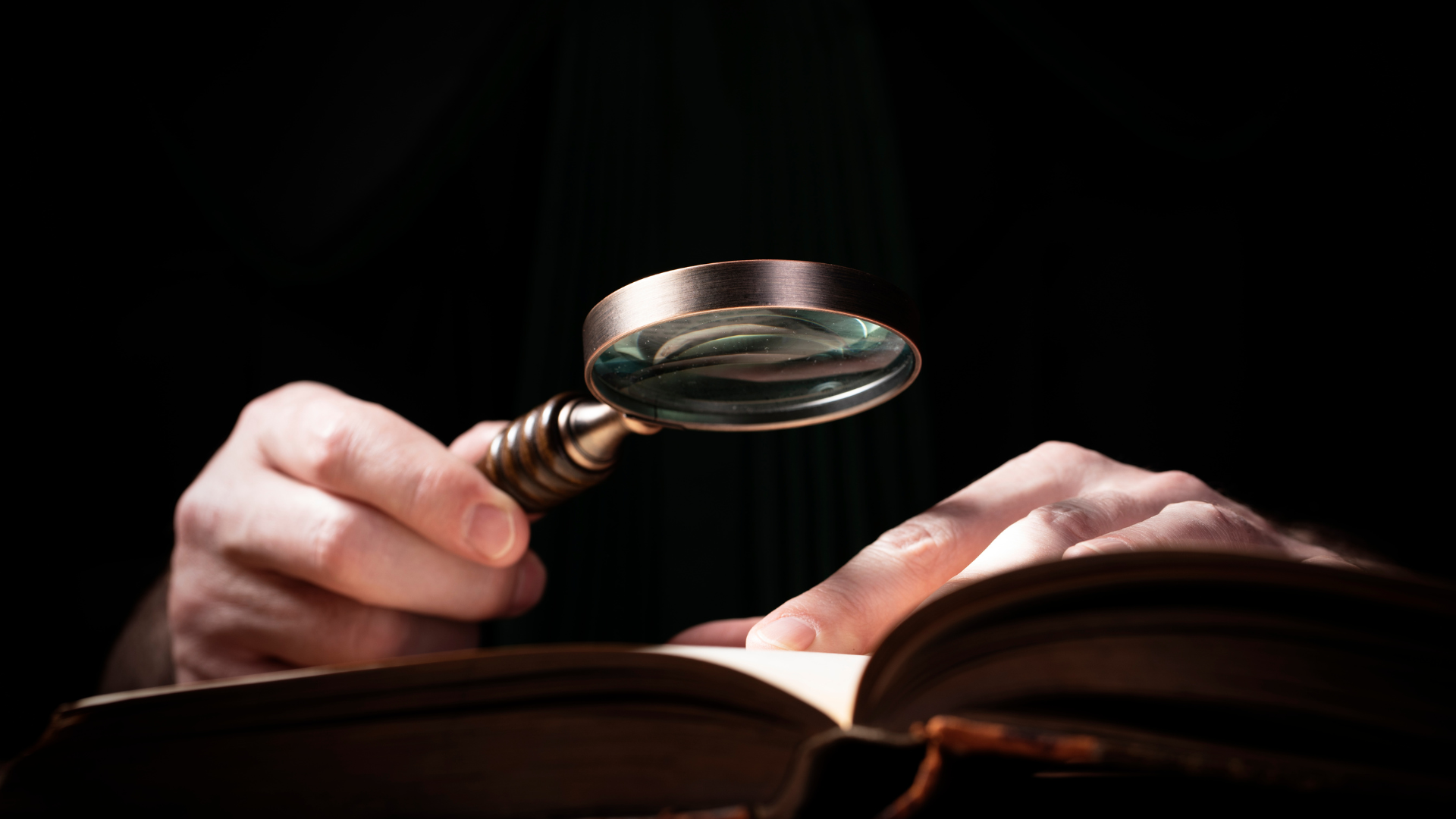 Private investigator reviewing corporate documents during an investigation.